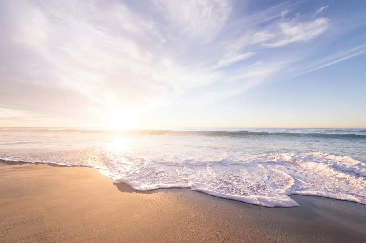 Calm ocean sunset evoking peace and clarity