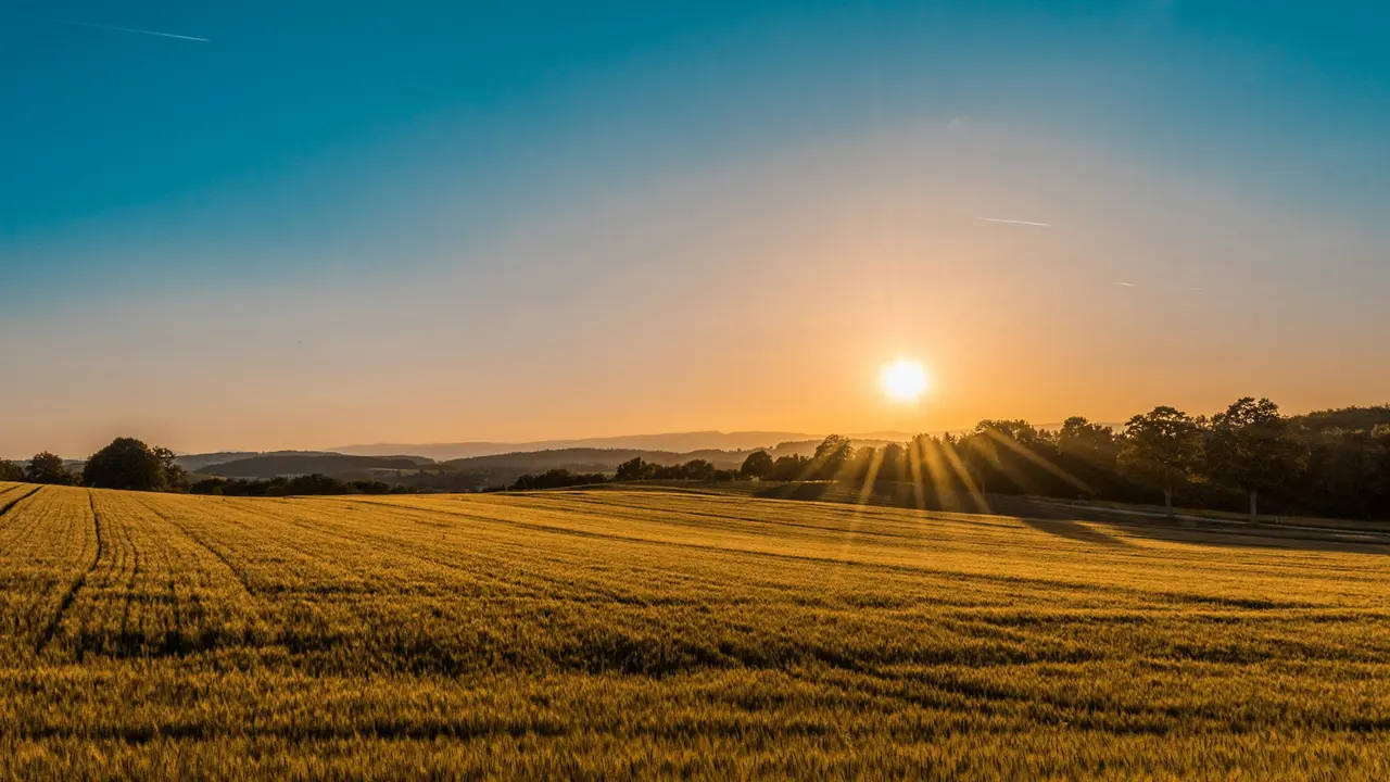 Sunrise over a peaceful coastal landscape reflecting new beginnings